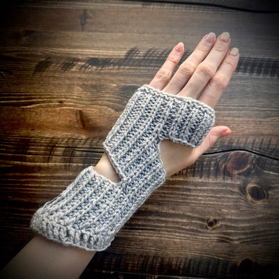 Handmade knitted sparkling grey wrist warmers