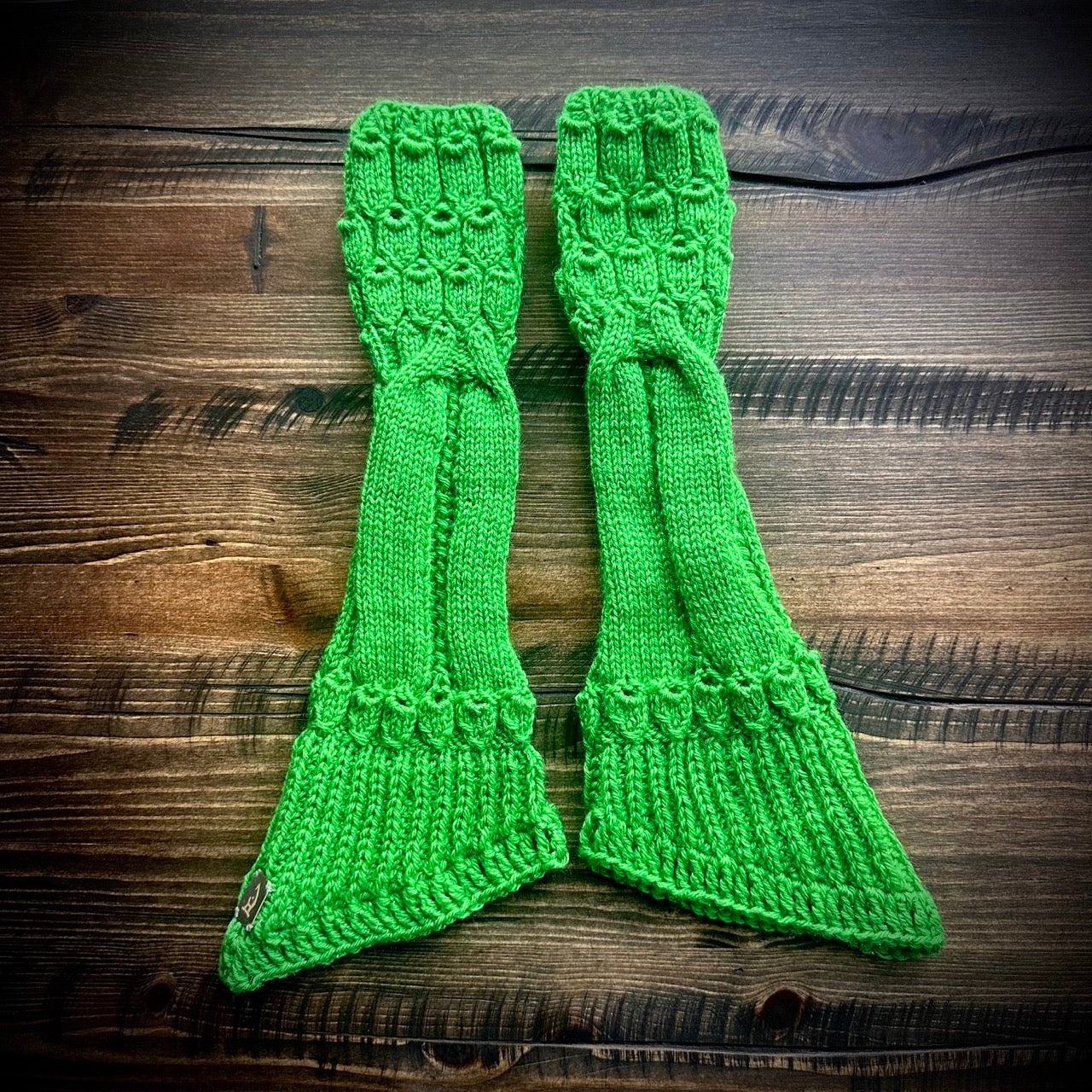 Handmade knitted sparkling emerald arm warmers