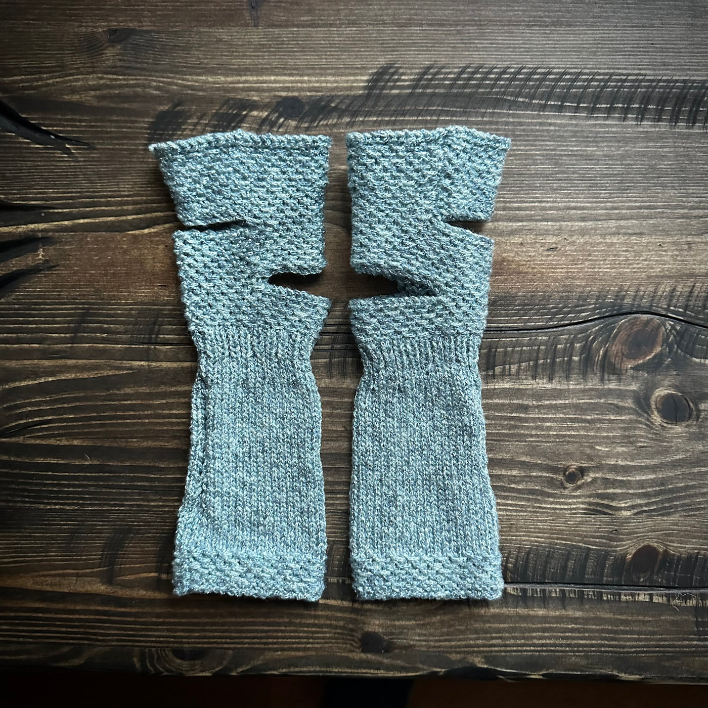 Handmade knitted sparkling blue wrist warmers