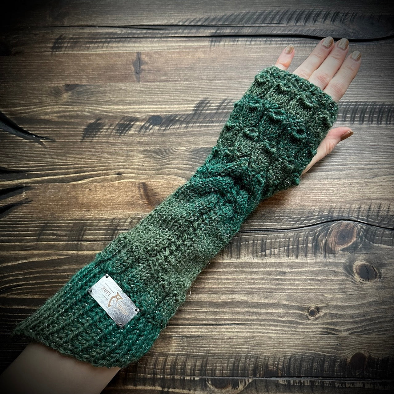 Handmade knitted sparkling green arm warmers