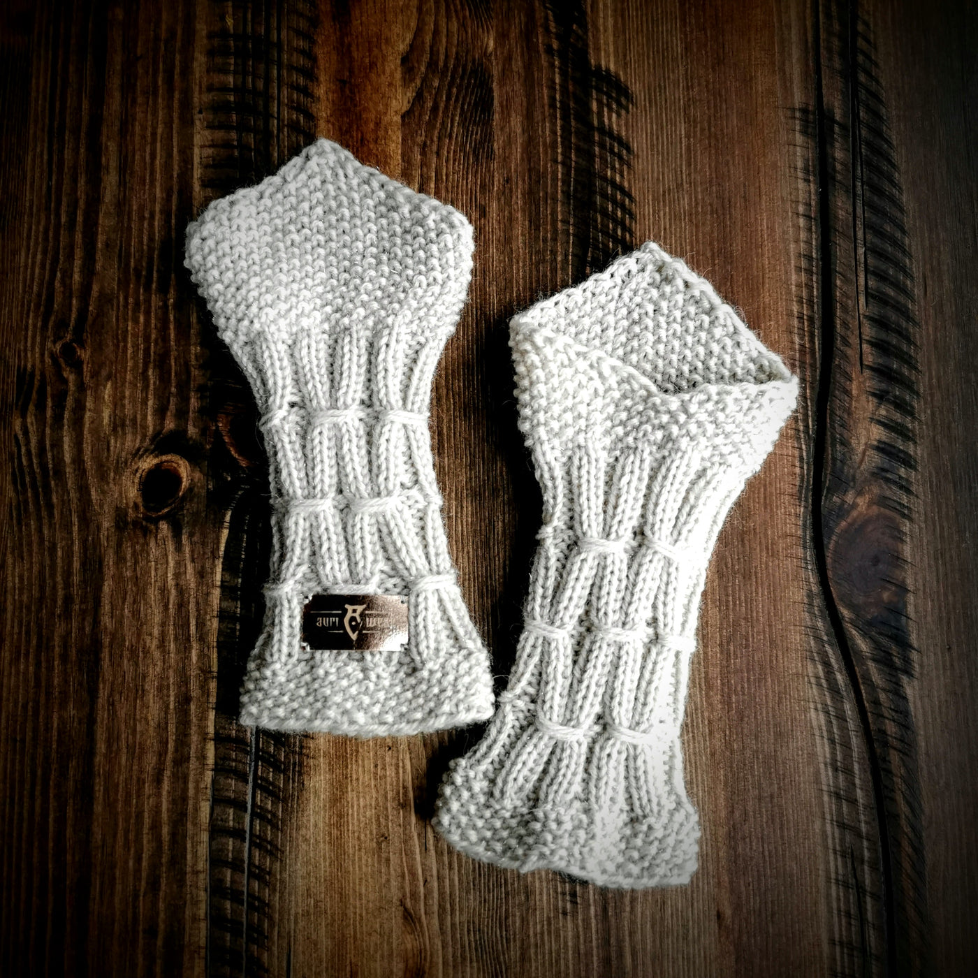 Handmade knitted sparkling white wrist warmers